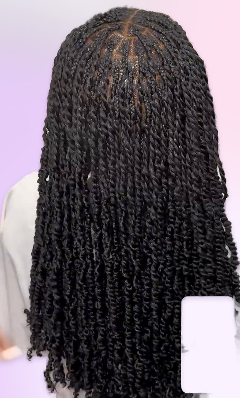 Spring twists styled at Braids Worth