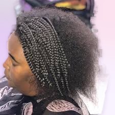 Take out braids styled at Braids Worth