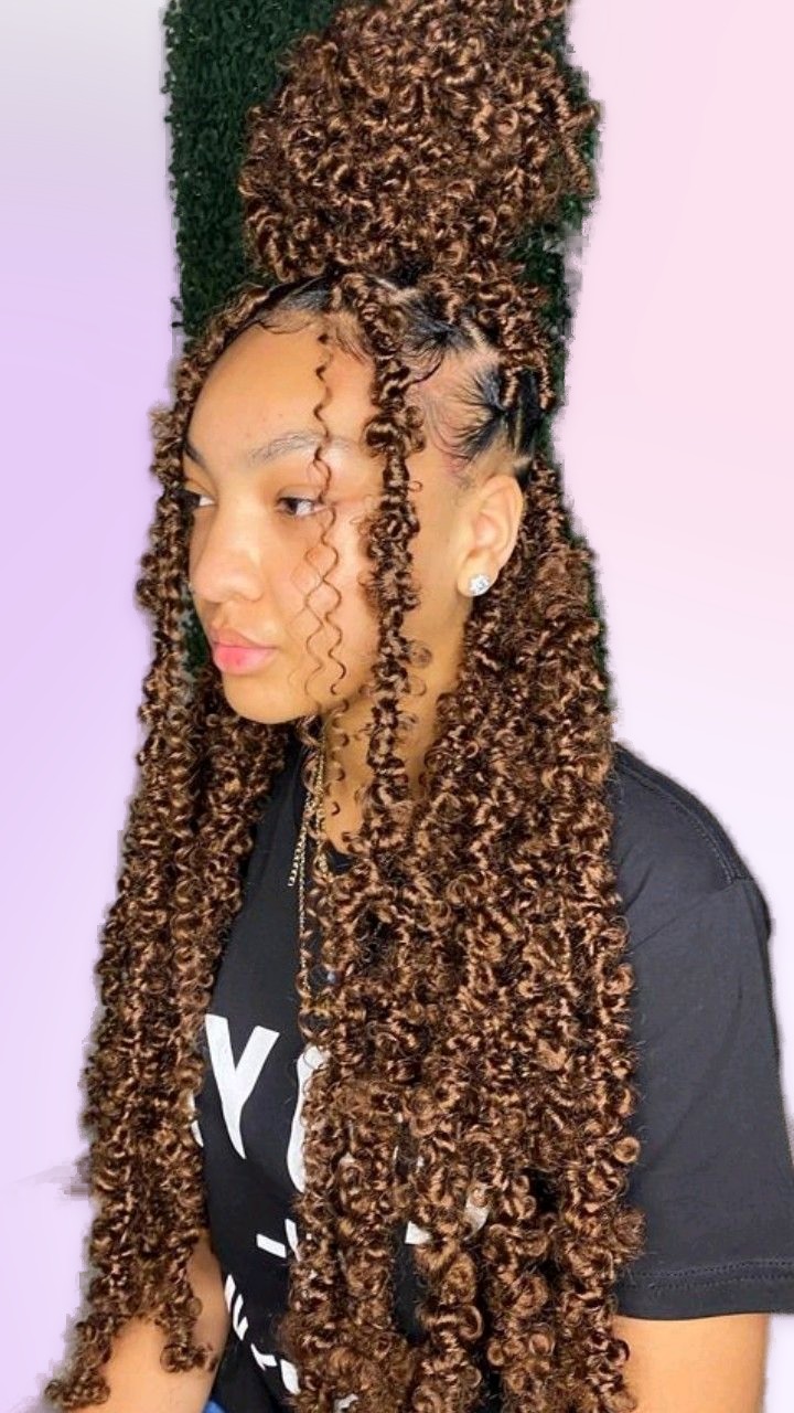 Butterfly locs styled at Braids Worth